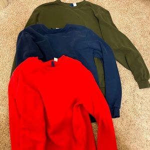 Three H&M throw on sweaters.